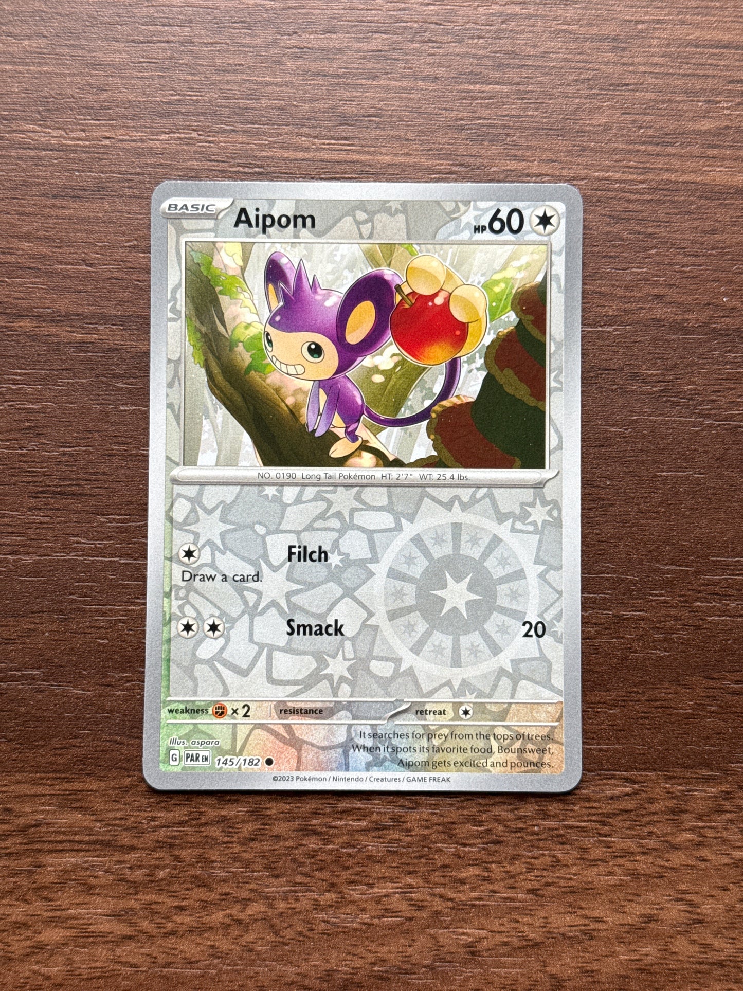 145/182 | Aipom Rev Holo | Paradox Rift