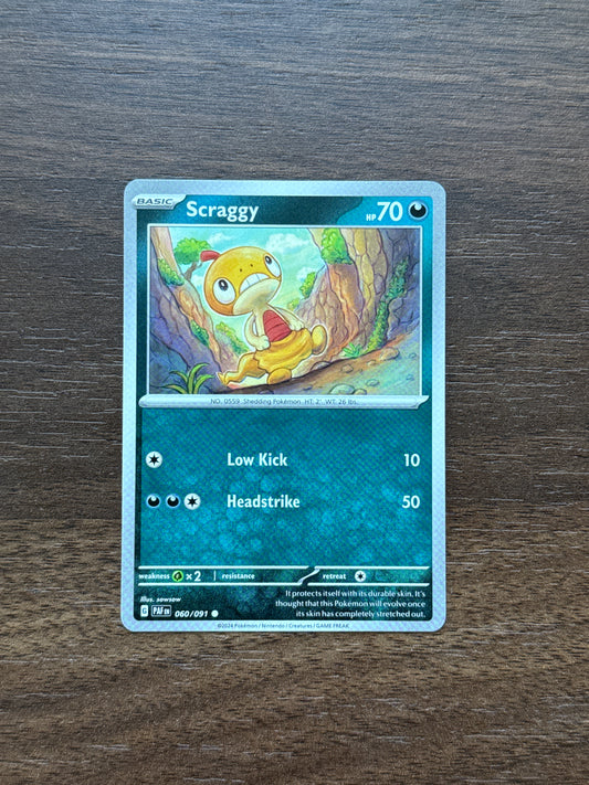 060/091 | Scraggy Common | Paldean Fates